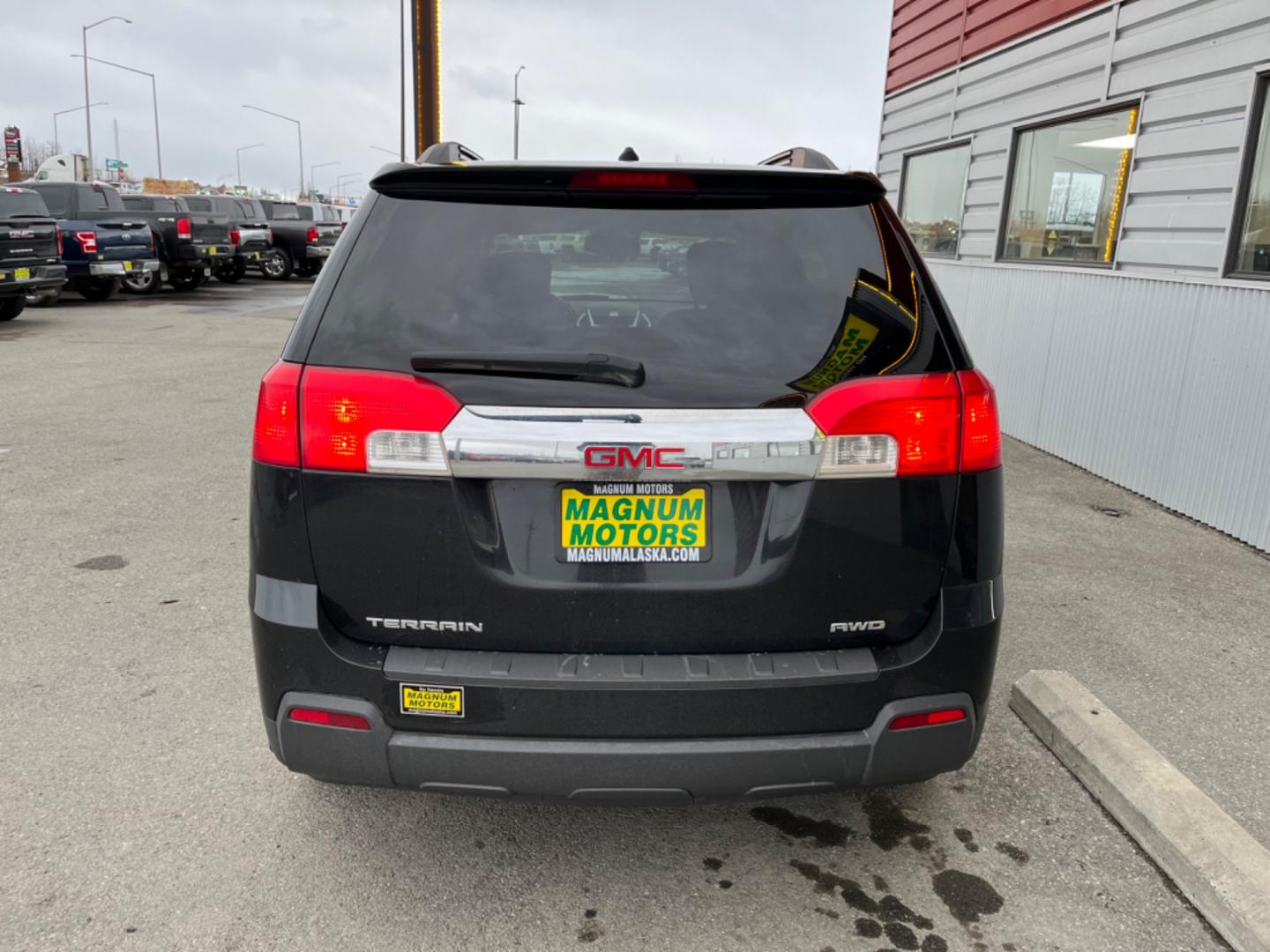 2011 Black /charcoal cloth GMC Terrain SLE2 AWD (2CTFLTEC8B6) with an 2.4L L4 DOHC 16V engine, 6-Speed Automatic transmission, located at 1960 Industrial Drive, Wasilla, 99654, (907) 274-2277, 61.573475, -149.400146 - Photo#3